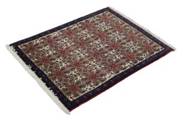Close-up detail of 1960s Senneh rug from Iran / Persia showing Wool weave