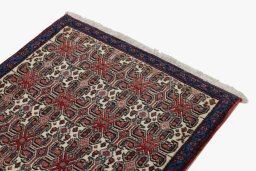 Surface texture of 1960s Senneh rug with natural Wool and intricate pattern