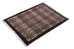 Close-up detail of 1950s Senneh rug from Iran / Persia showing Wool weave