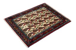 Corner detail of 1990s Senneh rug showing border pattern and Wool pile