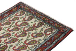 Surface texture of 1990s Senneh rug with natural Wool and intricate pattern