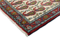 Backside of handmade 1990s Senneh rug showing knot structure and weave density