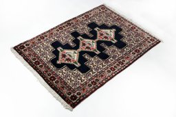 Close-up detail of 1990s Senneh rug from Iran / Persia showing Wool weave