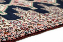 Central medallion detail of 1990s Senneh rug from Iran / Persia