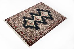 Close-up detail of 1990s Senneh rug from Iran / Persia showing Wool weave