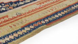 Backside of handmade 1920s Senneh rug showing knot structure and weave density
