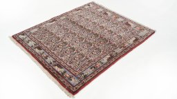 Close-up detail of 1950s Senneh rug from Iran / Persia showing Wool weave
