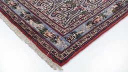 Backside of handmade 1950s Senneh rug showing knot structure and weave density