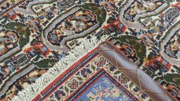 Close-up detail of 1950s Senneh rug from Iran / Persia showing Wool weave