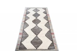 Surface texture of 2000s Shiraz rug with natural Wool and intricate pattern