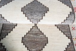 Full view of 2000s Shiraz rug from Iran / Persia, 177 × 90 cm in Beige tones
