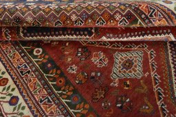 Full view of 2000s Shiraz rug from Iran / Persia, 257 × 162 cm in Red tones