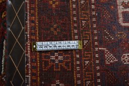 Surface texture of 2000s Shiraz rug with natural Wool and intricate pattern