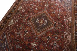 Backside of handmade 2000s Shiraz rug showing knot structure and weave density