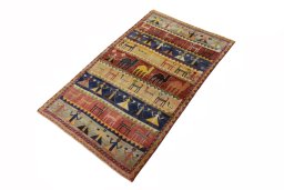 Corner detail of 2000s Shiraz rug showing border pattern and Wool pile