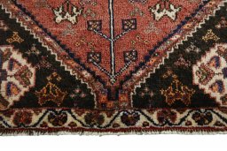 Close-up detail of 2000s Shiraz rug from Iran / Persia showing Wool weave