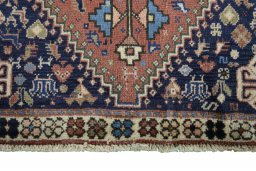 Close-up detail of 2000s Shiraz rug from Iran / Persia showing Wool weave