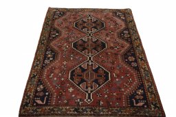 Surface texture of 2000s Shiraz rug with natural Wool and intricate pattern