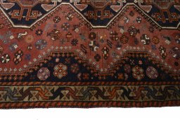Close-up detail of 2000s Shiraz rug from Iran / Persia showing Wool weave