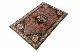 Corner detail of 2000s Shiraz rug showing border pattern and Wool pile