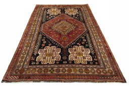 Surface texture of 2000s Shiraz rug with natural Wool and intricate pattern