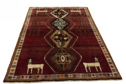 Surface texture of 2000s Shiraz rug with natural Wool and intricate pattern