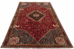 Surface texture of 2000s Shiraz rug with natural Wool and intricate pattern