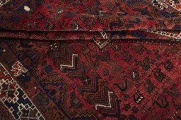 Full view of 2000s Shiraz rug from Iran / Persia, 300 × 203 cm in Red tones