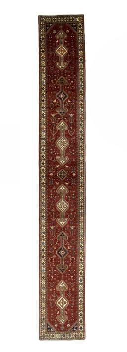 Full view of 2000s Shiraz rug from Iran / Persia, 590 × 86 cm in Red tones