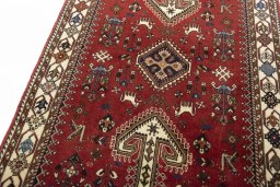 Backside of handmade 2000s Shiraz rug showing knot structure and weave density