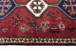 Close-up detail of 2000s Shiraz rug from Iran / Persia showing Wool weave