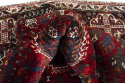 Close-up detail of 2000s Shiraz rug from Iran / Persia showing Wool weave