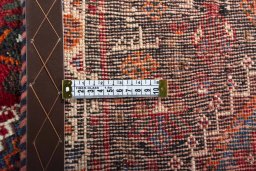 Surface texture of 2000s Shiraz rug with natural Wool and intricate pattern
