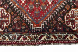 Close-up detail of 2000s Shiraz rug from Iran / Persia showing Wool weave