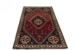 Surface texture of 2000s Shiraz rug with natural Wool and intricate pattern