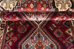 Full view of 2000s Shiraz rug from Iran / Persia, 262 × 106 cm in Red tones