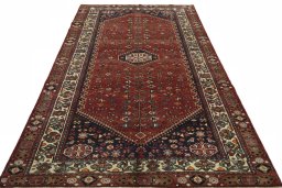 Surface texture of 2000s Shiraz rug with natural Wool and intricate pattern