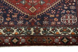 Close-up detail of 2000s Shiraz rug from Iran / Persia showing Wool weave