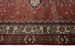Full view of 2000s Shiraz rug from Iran / Persia, 286 × 162 cm in Red tones
