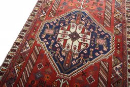 Backside of handmade 2000s Shiraz rug showing knot structure and weave density