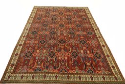 Surface texture of 2000s Shiraz rug with natural Wool and intricate pattern