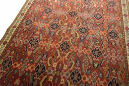 Backside of handmade 2000s Shiraz rug showing knot structure and weave density