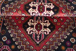 Full view of 2000s Shiraz rug from Iran / Persia, 176 × 117 cm in Red tones