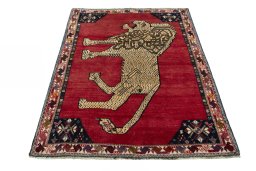 Surface texture of 2000s Shiraz rug with natural Wool and intricate pattern