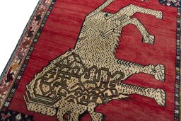 Backside of handmade 2000s Shiraz rug showing knot structure and weave density