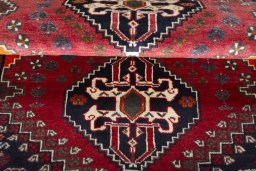 Full view of 2000s Shiraz rug from Iran / Persia, 171 × 115 cm in Red tones