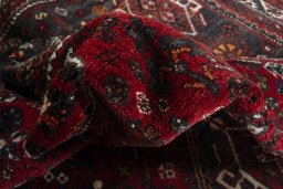 Close-up detail of 2000s Shiraz rug from Iran / Persia showing Wool weave