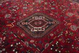 Central medallion detail of 2000s Shiraz rug from Iran / Persia