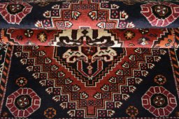 Full view of 2000s Shiraz rug from Iran / Persia, 176 × 114 cm in Red tones