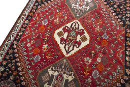 Backside of handmade 2000s Shiraz rug showing knot structure and weave density
